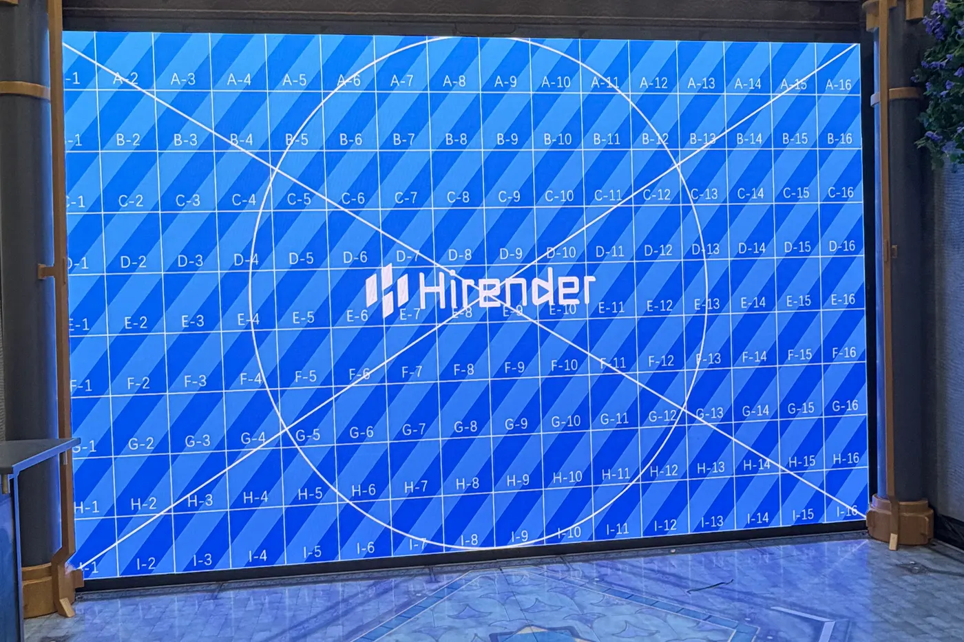 July 1, 2026: calibrating a booth wall, the day before opening