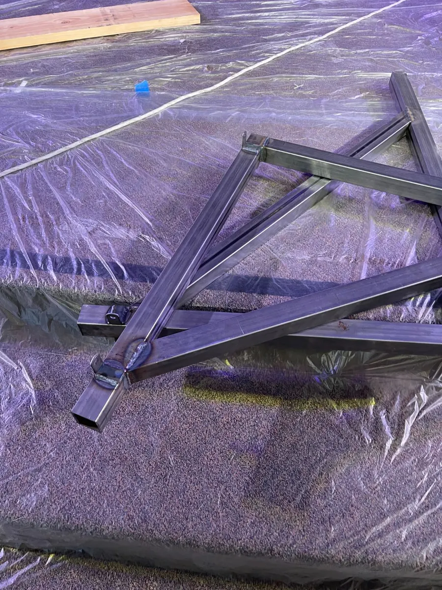 One of the welded brackets before installation