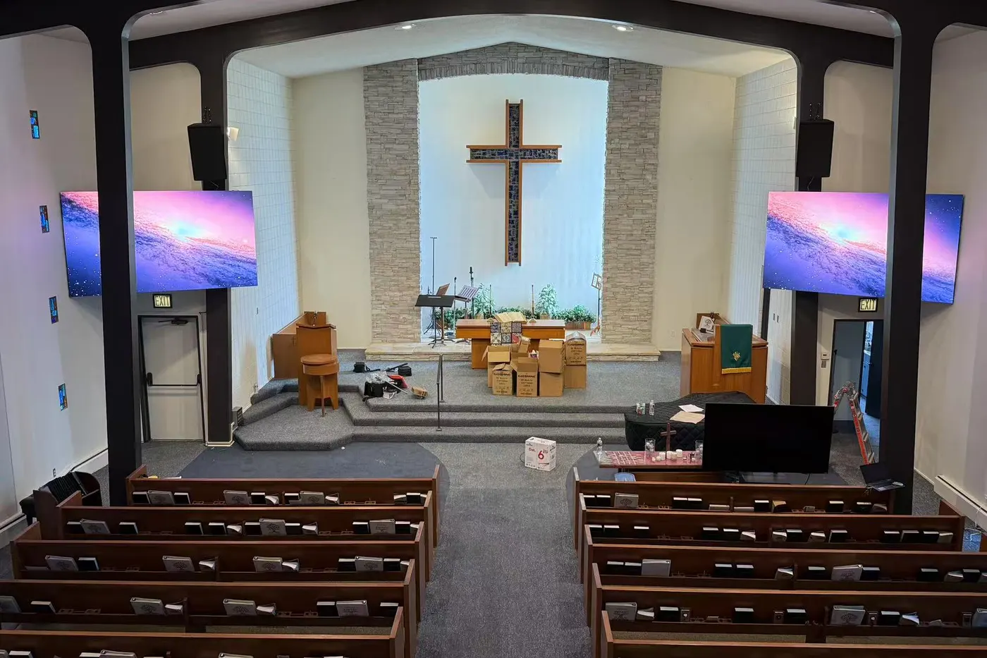 Two LED screens either side of the cross at Live Oak United Church of Christ, Brea