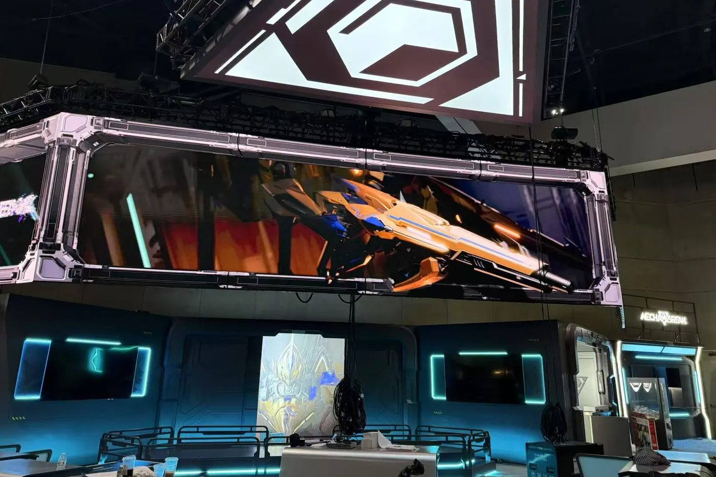 Show time, July 2025: the flown wall above the booth