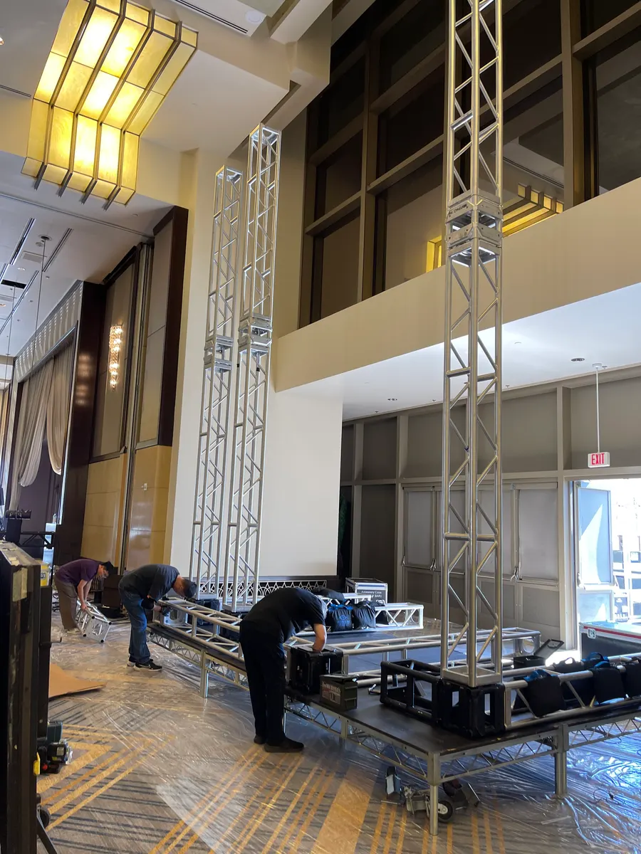 October 19: the truss towers going up, the room’s doors behind them